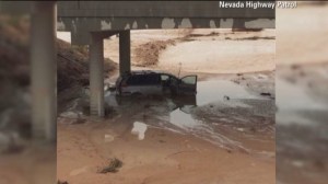 Flash flooding washed a portion of Interstate 15 away Monday, September 9, 2014, near the community of Glendale, Nevada, taking many vehicles with it. (Credit: Nevada HIghway Patrol) 