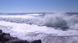 High surf is seen buffeting the Southern California coast in a file photo. (Credit: KTLA)