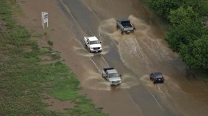 Streets were flooded in Lake Elsinore amid a thunderstorm on Sept. 16, 2014. (Credit: KTLA)