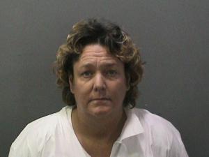 Laura Cox is shown in a booking photo released Sept. 9, 2014.