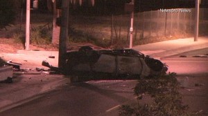 A vehicle came to a stop on its side after a fatal crash in Ontario on Thursday, Sept. 18, 2014. (Credit: Newspro News)