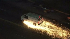 A van threw off sparks toward the end of a police pursuit in South Los Angeles on Sept. 17, 2014. (Credit: KTLA)