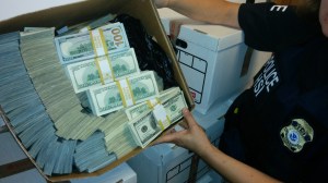 Authorities arrested nine people and seized tens of millions of dollars as part of and investigation into suspected money laundering related to drug trafficking. (Credit: Department of Justice)