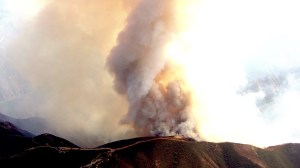 A huge plume of smoke rising from the Silverado Fire was visible for miles on Sept. 12, 2014. (Credit: KTLA)