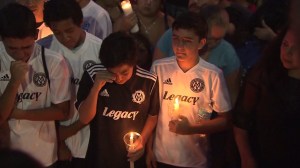 Mourners attended a vigil at Capistrano Valley High School on Oct. 5, 2014. (Credit: KTLA)