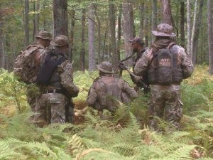 The Bureau of Alcohol, Tobacco, Firearms and Explosives released this image through its Twitter stream Sunday, Sept. 21, 2014, showing agents searching for suspected cop-killer Eric Matthew Frein.