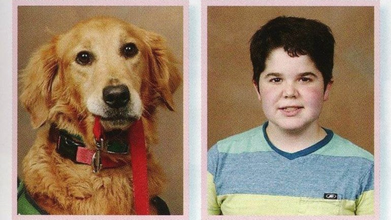 Presley the service dog got to be in the school yearbook next to his owner/friend Seph.