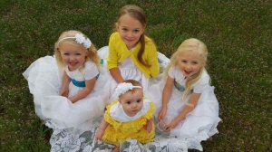 4-year-old Heidi Miller survived a crash with a train. She is on the far right in the photo. The crash near Trinidad, Colo. killed her parents and three sisters.