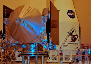 The OSIRIS-REx spacecraft sits on its workstand August 20, 2016 at Kennedy Space Center, Florida. Photo credit: Bruce Weaver/AFP/Getty Images