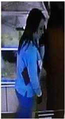 The female suspect is described as a white woman in her 20s, with dark hair.