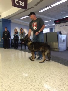 Tuko with Officer Davis at Hopkins Airport- 1/26/16 (Photo: FOX 8's Roosevelt Leftwich)