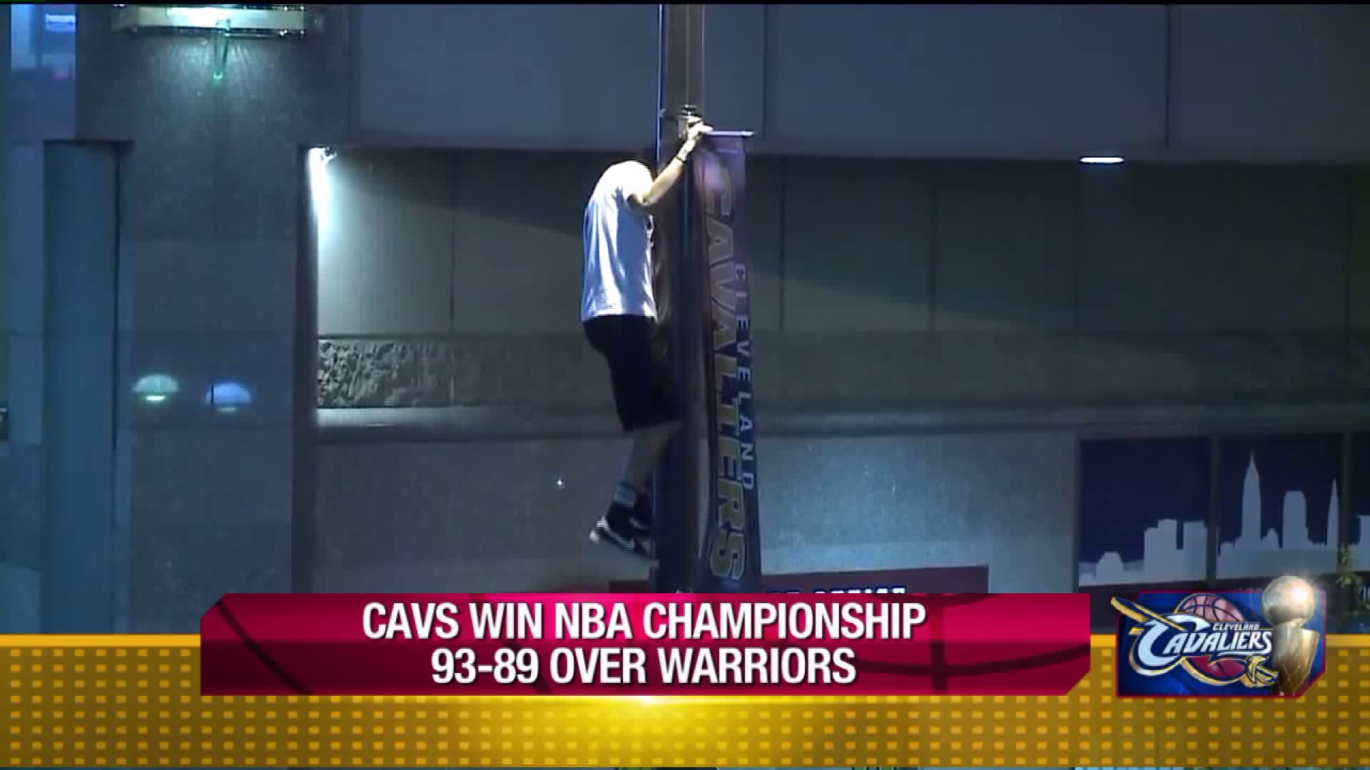 Fan seen climbing a pole downtown following Cavs win Sunday night