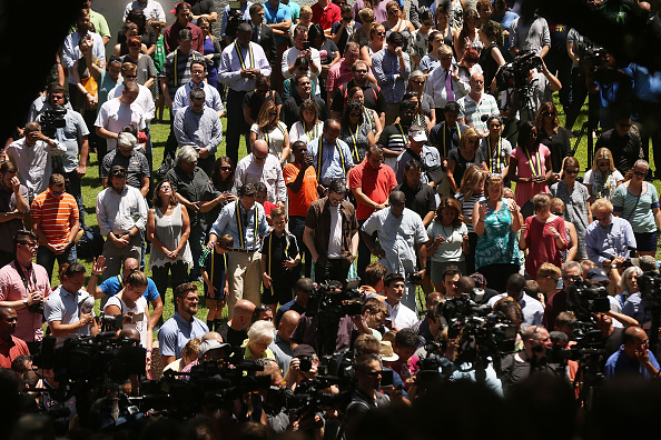 DALLAS, TX - JULY 08: People gather in a prayer vigil following the shooting deaths of five police officers last night during a Black Live Matter march on July 8, 2016 in Dallas, Texas. Five police officers were killed and seven others were injured in a coordinated ambush at a anti-police brutality demonstration in Dallas. Investigators are saying the suspect is 25-year-old Micah Xavier Johnson of Mesquite, Texas. This is the deadliest incident for U.S. law enforcement since September 11. (Photo by Spencer Platt/Getty Images)