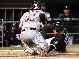 CHICAGO, IL - SEPTEMBER 12: Avisail Garcia #26 of the Chicago White Sox is safe at home as Roberto Perez #55 of the Cleveland Indians makes a late tag during the second inning on September 12, 2016 at U.S. Cellular Field in Chicago, Illinois. (Photo by David Banks/Getty Images)