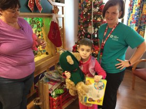Madison receiving a gift (Photo courtesy: FOX 8's Dave Nethers)