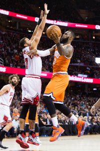 CLEVELAND, OH - JANUARY 4: Michael Carter-Williams #7 of the Chicago Bulls tries to block LeBron James #23 of the Cleveland Cavaliers during the first half at Quicken Loans Arena on January 4, 2017 in Cleveland, Ohio. NOTE TO USER: User expressly acknowledges and agrees that, by downloading and/or using this photograph, user is consenting to the terms and conditions of the Getty Images License Agreement. Mandatory copyright notice. (Photo by Jason Miller/Getty Images)