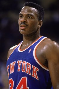 Charles Oakley #34 of the New York Knicks stands on the court during an NBA game at Madison Square Garden in New York City, New York in 1989. (Photo by: Tim Defrisco/Getty Images)