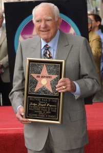 Judge Joseph A. Wapner poses with a copy of his star after he was honored with a Star on The Hollywood Walk of Fame on his 90th birthday in Hollywood, November 12, 2009. Judge Wapner is best known for presiding over the TV show "People's Court" for 13 years. AFP PHOTO/Mark RALSTON (Photo credit should read MARK RALSTON/AFP/Getty Images)