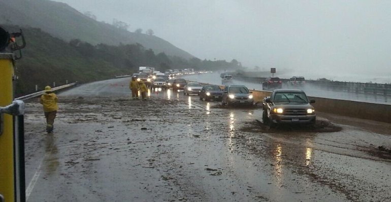 Torrential downpours were hitting Southern California on Friday, while northern parts of the state brace for the impact of more rain on Oroville Dam's damaged spillway early next week. Lanes are closed due to heavy rain and mud at Seacliff exit on the Pacific Coast Highway.