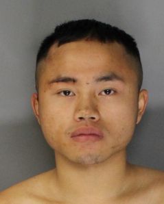 Ricky Lor, 19, and a 15-year-old were arrested and booked on charges of home invasion, false imprisonment, conspiracy, resisting arrest, and possession of firearms. Courtesy: Sacramento Police Dept