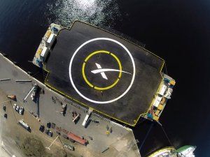 SpaceX will try to keep the base rocket section in good shape by landing it -- standing straight up -- on a barge floating in the ocean. The planned takeoff and controlled landing is scheduled either Jan. 6 or 7, 2015. Courtesy: CNN