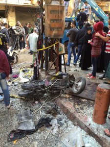 Blood and broken glass at the scene of yesterday's bombing in Beirut's southern suburbs. (Clarissa Ward/CNN)
