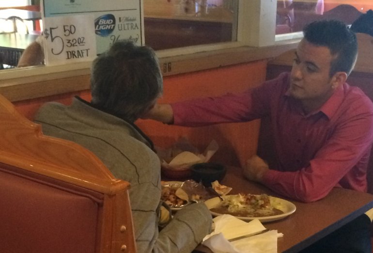 Alex Ruiz, a server at Cinco de Mayo restaurant in Douglasville, Georgia, went above and beyond his job — to feed a man without hands. (Courtesy: Courtesy of Reginald Widner via CNN)