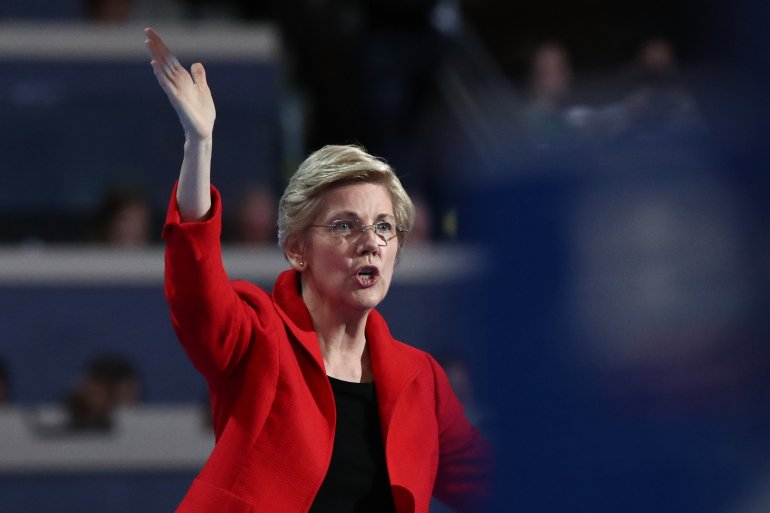 PHILADELPHIA, PA - JULY 25: Sen. Elizabeth Warren (D-MA) acknowledges the crowd during remarks on the first day of the Democratic National Convention at the Wells Fargo Center, July 25, 2016 in Philadelphia, Pennsylvania. An estimated 50,000 people are expected in Philadelphia, including hundreds of protesters and members of the media. The four-day Democratic National Convention kicked off July 25. (Photo by Jessica Kourkounis/Getty Images)
