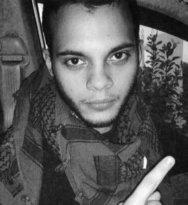 Five people were shot dead and eight wounded in a baggage claim area at Fort Lauderdale's airport, and law enforcement sources tell CNN the suspect, identified as Esteban Santiago, had brought the firearm in his checked