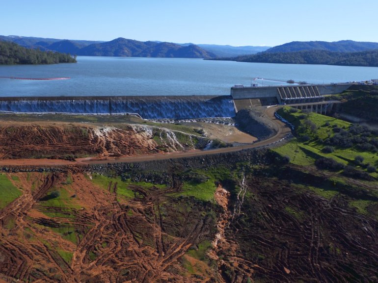 Water flows over the Oroville Dam's emergency spillway for the first time in the dam's history (Courtesy: DWR)
