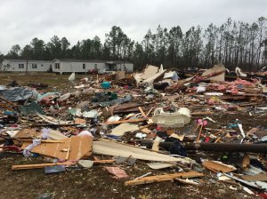 Across the South, communities are set to begin picking up the pieces as rough weather gives way to partly cloudy skies and moderate wind. One of the most chaotic scenes unfolded Sunday at the Sunshine Acres mobile home park near Adel in Cook County, Georgia.