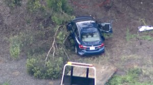 A sedan crashed into a tree on southbound SR-125.