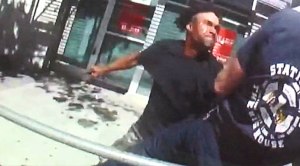 Body-worm camera captured video of a man fighting with firefighters.