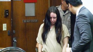 Amanda Brodd enters court before changing her plea to guilty.