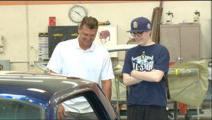 Trevor Hoffman and Bryce Newman check out his newly restored Mustang.