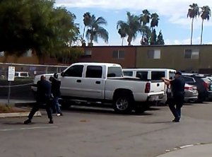 El Cajon police made public a still photo lifted from video taken at the scene showing a man in a shooting stance, although no weapon was recovered at the scene.