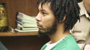 Christian Ewing, 27, is accused of jumping on stage at a Taylor Swift concert at Petco Park last year and seriously injuring a member of her security team.
