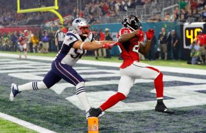 Tevin Coleman #26 of the Atlanta Falcons carries the ball past Rob Ninkovich #50 of the New England Patriots for a six yard touchdown during Super Bowl 51 at NRG Stadium on February 5, 2017 in Houston, Texas. (Getty Images)