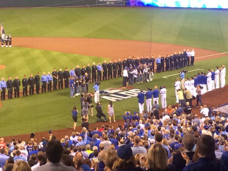 Before the start of the Game 5, the Kansas City Royals honored the Kansas City Missouri Fire Department (KCFD) with a moment of silence for fallen firefighters Larry Leggio and John Mesh, and the fans gave a standing ovation.