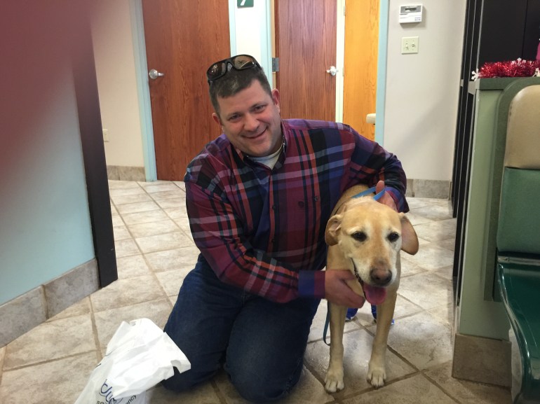 Troy Petersen is united with his dog Brodie on Christmas Eve.