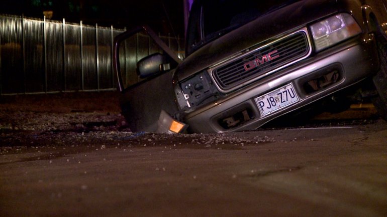 The woman was was driving the SUV that fell into a hole caused by a water main break says she wishes there would have been some kind of warning for drivers.