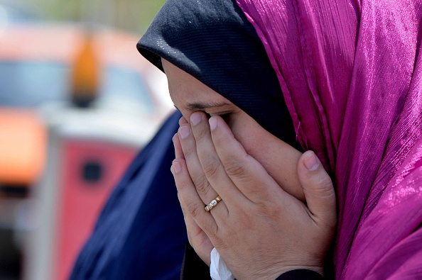 CAIRO, EGYPT - MAY 19: A relative of passenger onboard missing EgyptAir flight MS804 cries at Cairo International Airport as she tries to receive information in Cairo, Egypt on May 19, 2016. Airliner disappeared after entering the Egyptian airspace during its flight from Paris to Cairo. (Photo by Ala Ahmed/Anadolu Agency/Getty Images)