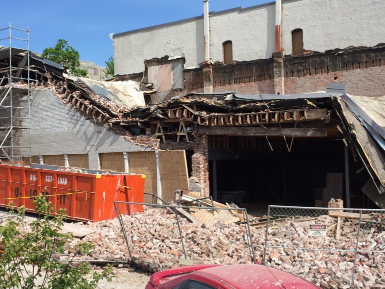 The old Ethan Allen building on the Liberty Square collapsed on Tuesday. 