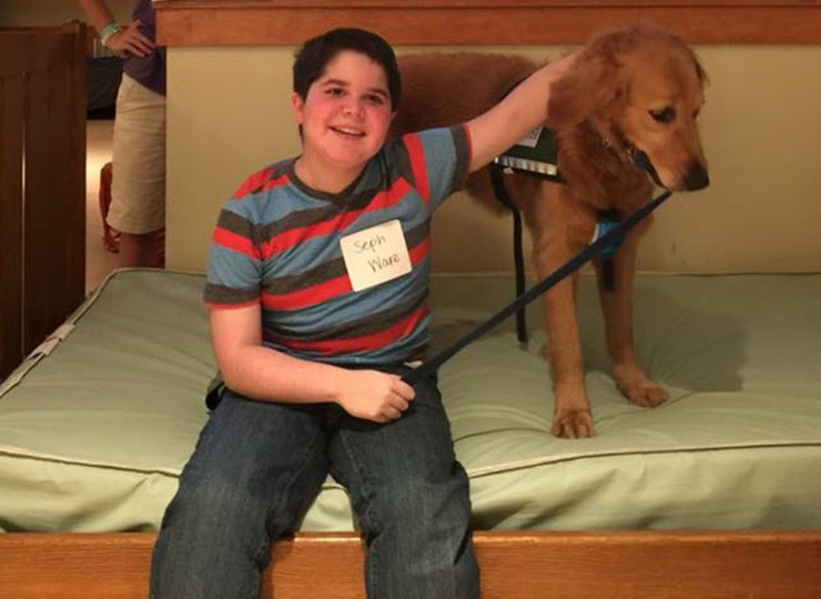 Presley the service dog is always at her owner's side, which is why she earned a spot alongside him in his middle-school yearbook. The goldendoodle accompanies 14-year-old Seph Ware to Good Hope Middle School in West Monroe, Louisiana, each day.