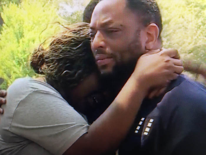Mahsaan's mother, grieving.