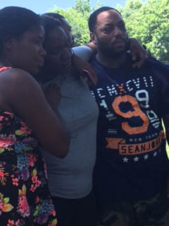 Mahsaan's parents at the park, appealing to the community to stop hurting the children.