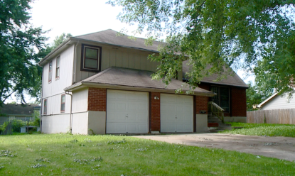 The home at 77th Terrace and Troost that police believe is where Long lived.