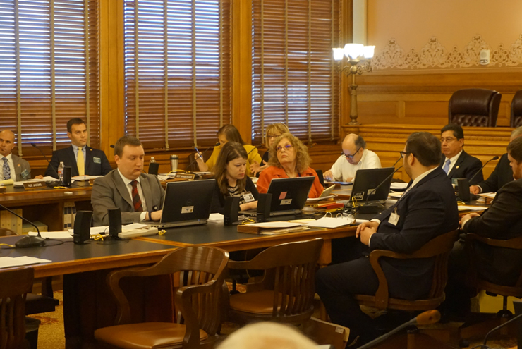A large crowd was present as each side argued whether guns should be allowed on campus.