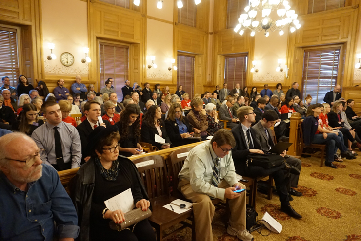 A large crowd was present as each side argued whether guns should be allowed on campus.