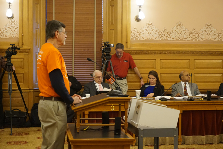 A large crowd was present as each side argued whether guns should be allowed on campus.